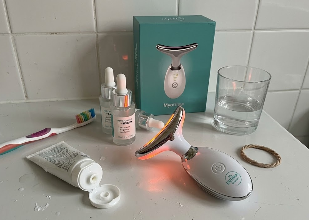 MyoGlow device on a bathroom counter, lived-in setting